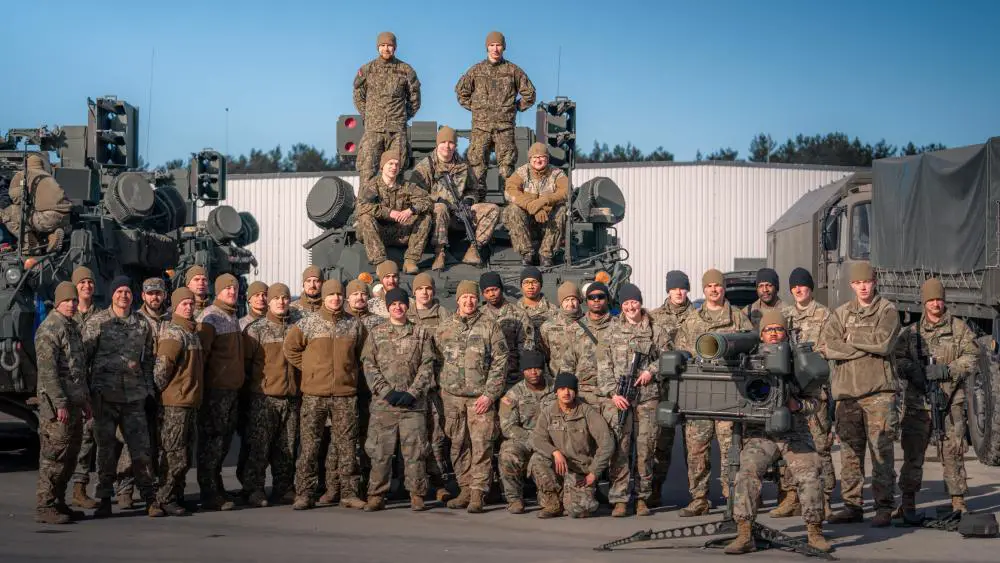 Air Defenders of the Latvian Air Force Ground-Based Air Defense and U.S. Army Soldiers assigned to the 10th Army Air & Missile Defense Command, pose with the U.S. Army’s new Maneuver Short Range Air Defense Styrker