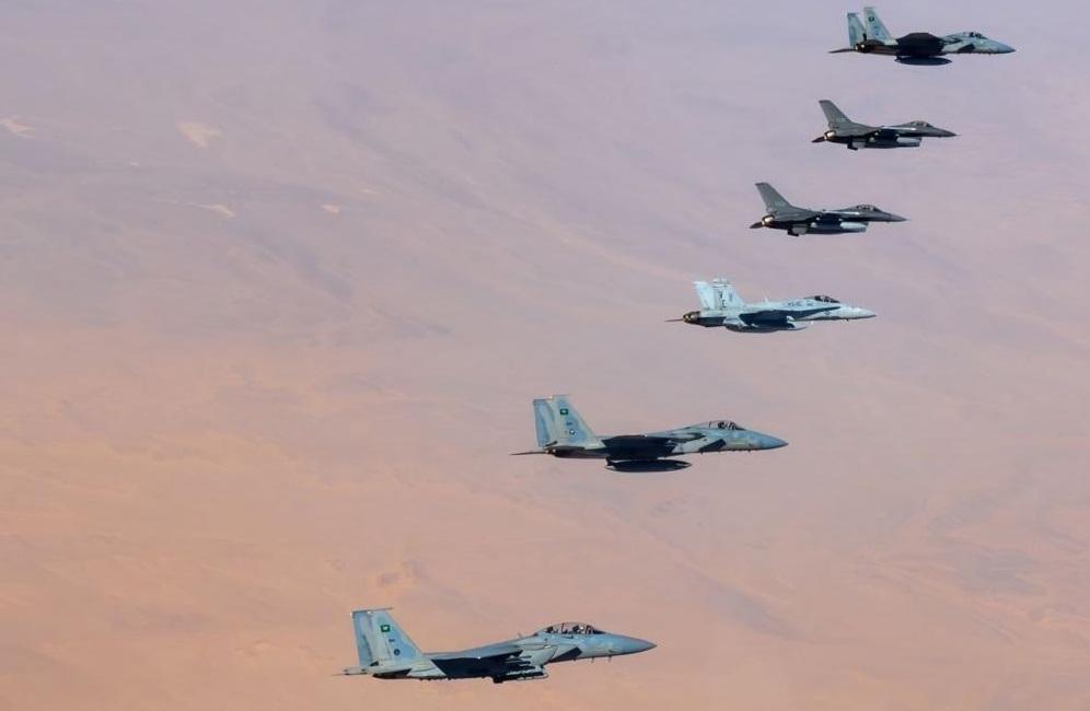 Royal Saudi Air Force F-15s fly alongside U.S. Air Force F-16 Fighting Falcons and a U.S. Marine Corps F/A-18 Hornet during Operation Agile Spartan II. Aircrew conducted Agile Combat Employment concepts throughout the U.S. Central Command area of responsibility during OAS II, which allows flexibility to operate from any location in a contested environment. 