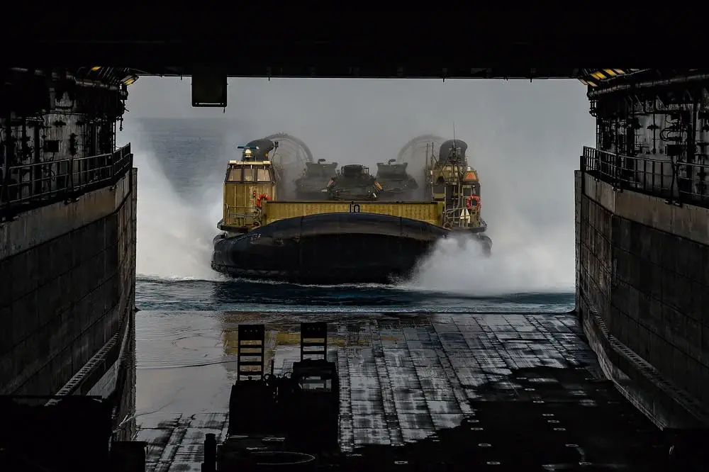 A landing craft air cushion (LCAC) enters the well deck of the amphibious transport dock ship USS Green Bay (LPD 20) during Cobra Gold 22.