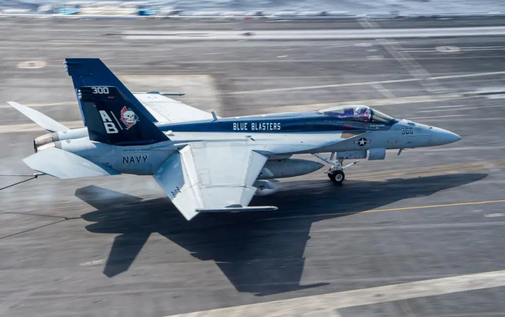 An F/A-18E Super Hornet, attached to the "Blue Blasters" of Strike Fighter Squadron 34, launches from the flight deck of the Nimitz-class aircraft carrier USS Harry S. Truman in support of enhanced Air Patrols 