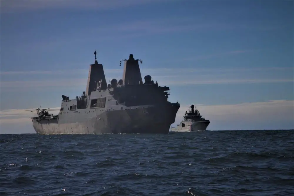  San Antonio-class amphibious transport dock ship USS Arlington (LPD 24), front, steams alongside Icelandic Coast Guard offshore patrol vessel ICGV Þór (UT 512L) in support of exercise Northern Viking 22.