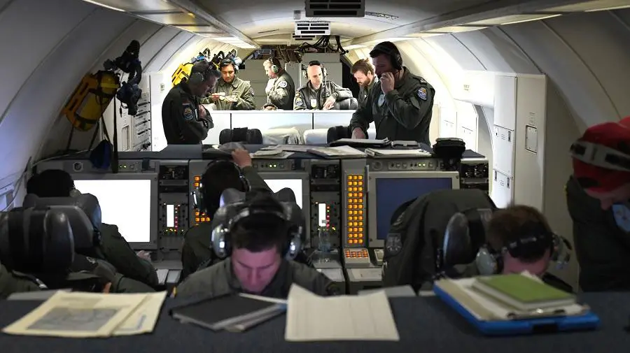 The crew on board the AWACS supported fighters by executing air surveillance and directing fighter jets during live-flying air combat training.