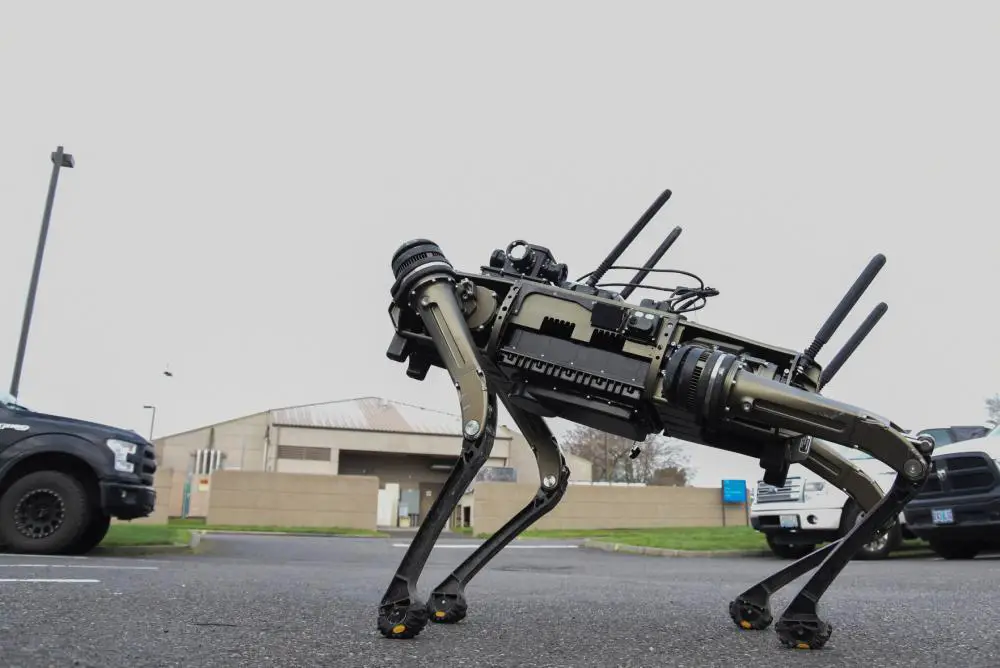 A Quadrupedal Unmanned Ground Vehicle (QUGV) or "robot dog" goes for a test run at Portland Air National Guard Base, Oregon.