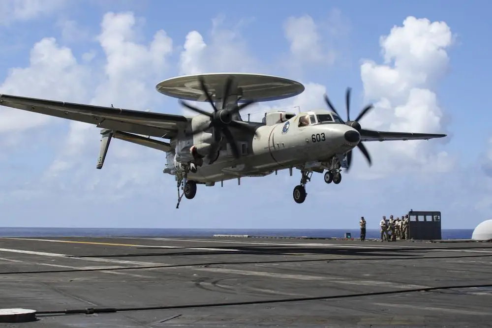 An E-2D Hawkeye, assigned to the "Wallbangers" of Carrier Airborne Early Warning Squadron (VAW) 117, prepares to make an arrested landing on the flight deck of the Nimitz-class aircraft carrier USS Abraham Lincoln (CVN 72).