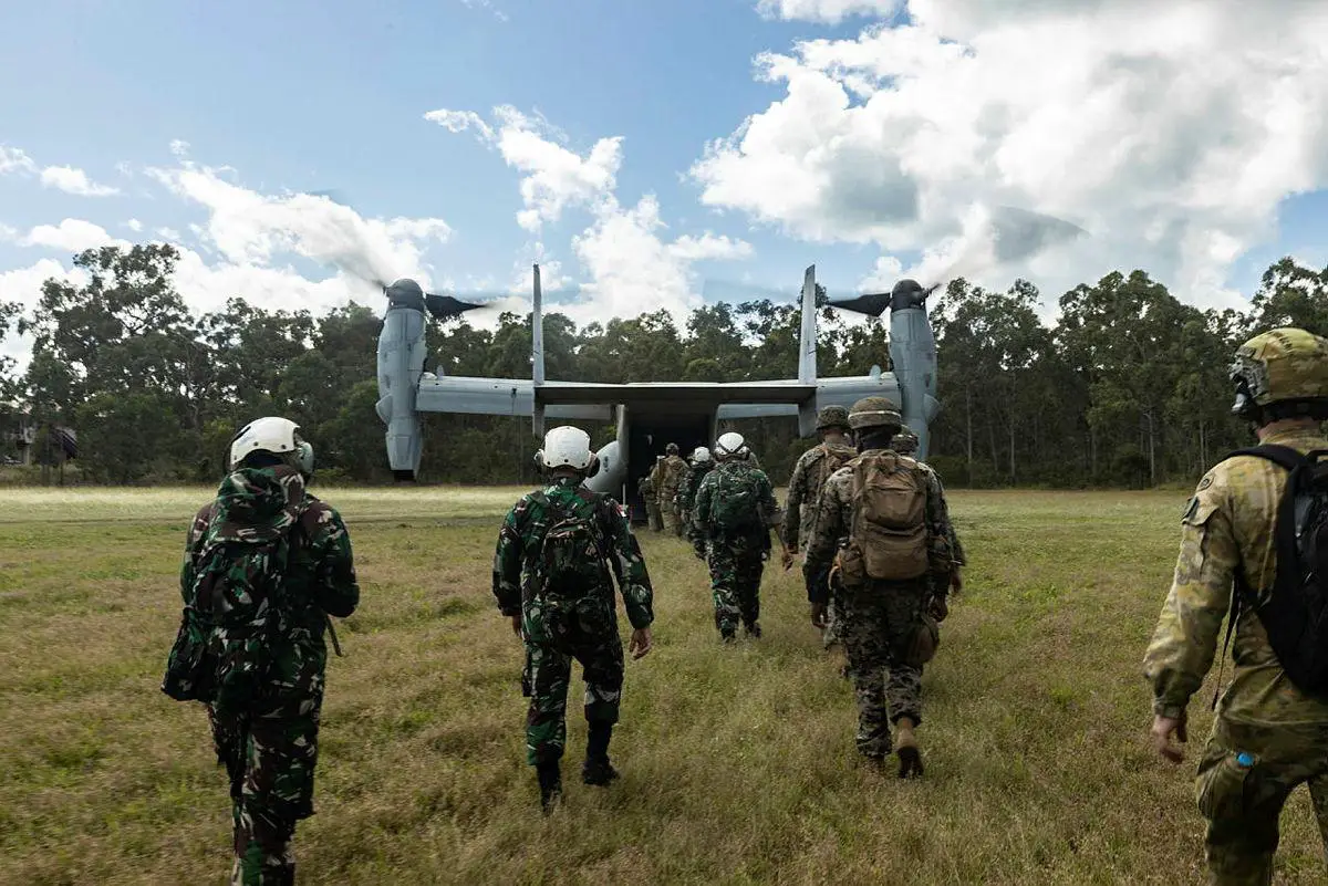 ADF, U.S. Marines, and Indonesian forces board an MV-22 Osprey during Exercise Crocodile Response 22, a trilateral HADR activity in Nhulunbuy, NT.