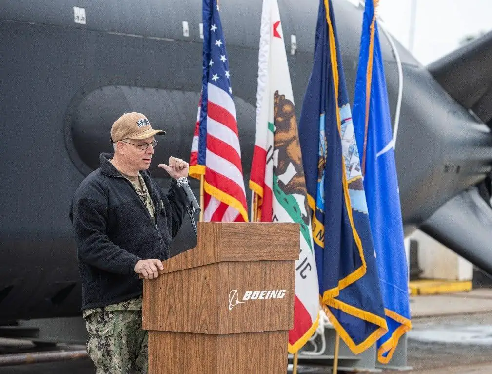 Capt. Scot Searles, Program Manager of PMS 406 (Unmanned Maritime Systems), gives remarks during a christening ceremony in Huntington Beach, California. 