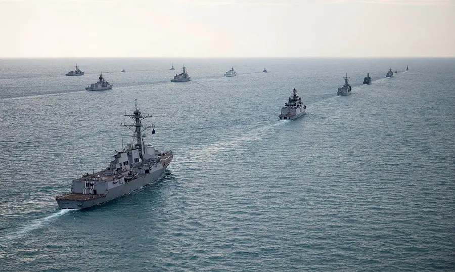 United States Navy ship, USS Michael Murphy, information with other multinational ships during Exercise Kakadu 2018.