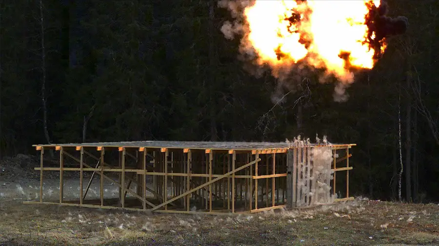 Two HE 448 rounds detonate as air burst over a target - high speed camera