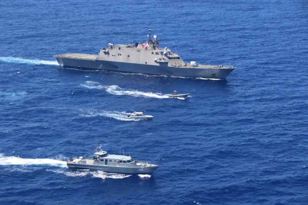 The Freedom-variant littoral combat ship USS Wichita (LCS 13), the Dominican Republic coastal patrol vessel Altair (GC-112), and Dominican Republic Boston Whaler interceptor patrol boat Duhbe (LI-164) conduct a bilateral maritime interdiction exercise, May 5, 2022.