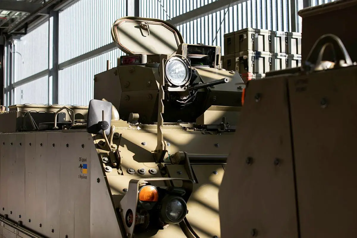 A M113AS4 Armoured Personnel Carrier fitted with a .50 calibre heavy machine gun, prepares to depart RAAF Base Amberley, Queensland, bound for Ukraine.