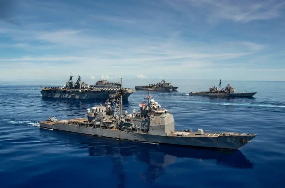  USS Shiloh (CG 67), front, USS America (LHA 6), USS Antietam (CG 54), USS Germantown (LSD 42) and USNS Sacagawea (T-AKE 2), steam in formation with the Navy’s only forward-deployed aircraft carrier USS Ronald Reagan (CVN 76), in support of Valiant Shield 2020. 