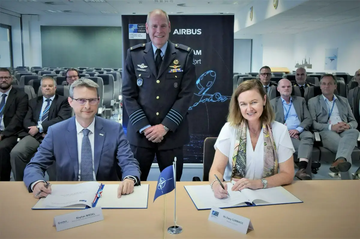  Stephan Miegel (Head of Military Air Systems Services, Airbus Defence and Space), Colonel Jurgen van der Biezen (MMU Commander), and Ms Stacy Cummings 