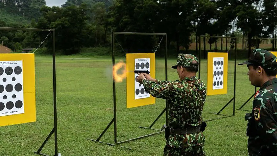 A soldier from the Vietnam People's Army participates in the second Australia-Vietnam Combat Shooting Skills Exchange. 