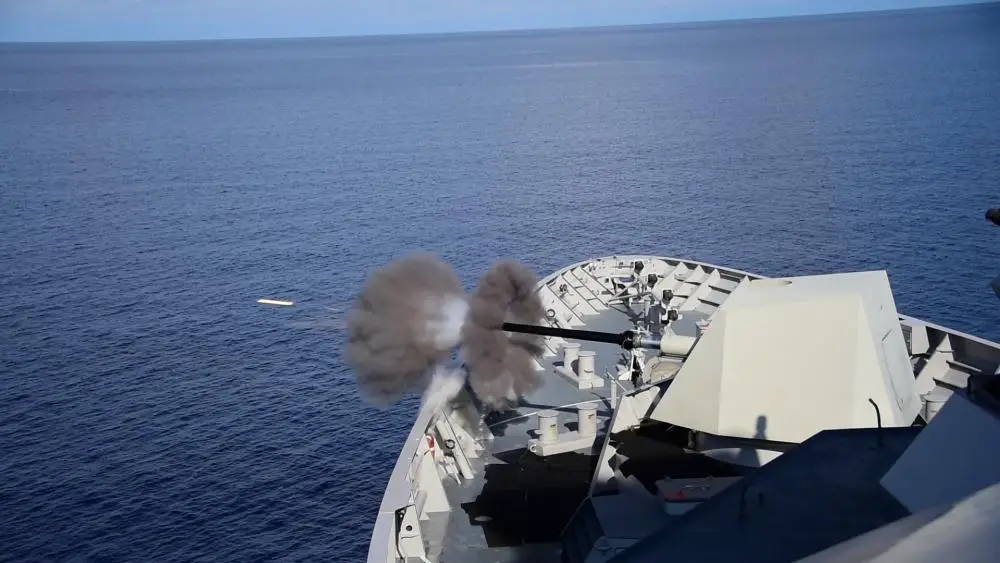  Indonesian Navy frigate KRI I Gusti Ngurah Rai (332) fires its 76 mm cannon during a gunnery exercise as part of Rim of The Pacific (RIMPAC) 2022. 