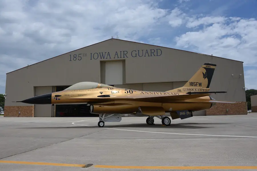 A gold U.S. Air Force F-16A Falcon from the Iowa Air National Guard is on the ramp in Sioux City, Iowa on June 30, 2022. The jet is painted with commemorative anniversary paint scheme that replicates the unit’s 50th anniversary gold jet as it appeared in 1996. The 2022 redesign of the 185th Air Refueling Wing static display was unveiled as the Air Force celebrates its 75th Anniversary this year. U.S. Air Force photo Senior Master Sgt. Vincent De Groot