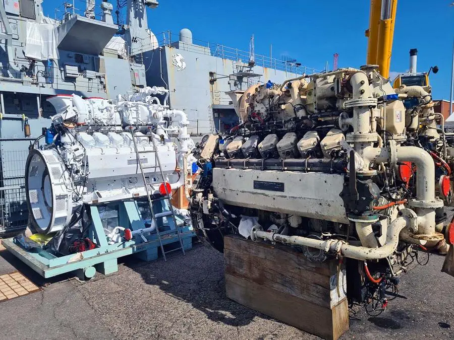 A new diesel generator (left) prepares to replace the old one