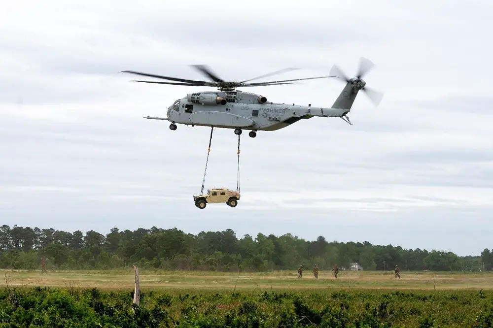 CH-53K King Stallion picks up a tactical vehicle during Exercise Potomac Restore on Camp Lejeune, North Carolina, May 10, 2022. 
