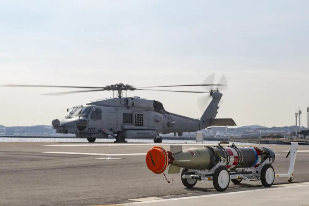A MK 54 Lightweight Torpedo is on the tarmac in preparation for mounting on an MH-60R Sea Hawk Helicopter