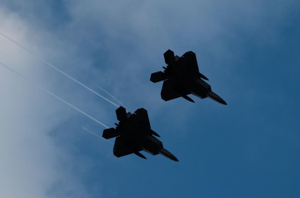 F-22 Raptors with the 90th Fighter Squadron, 3rd Wing, Joint Base Elmendorf-Richardson, Alaska, fly over the air field at Royal Air Force Lakenehath, England, July 26, 2022. 