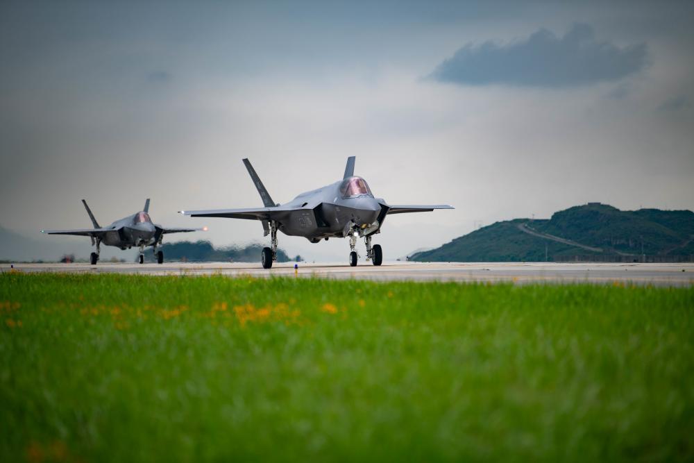 Two F-35A Lightning II’s taxi down a runway at Kunsan Air Base, Republic of Korea, July 11, 2022.