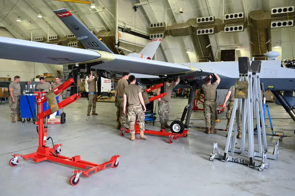 U.S. Air Force members of the 119th Wing assemble an MQ-9 reaper aircraft for exercise Valiant Shield at Anderson Air Force Base, Guam, May 26, 2022. 
