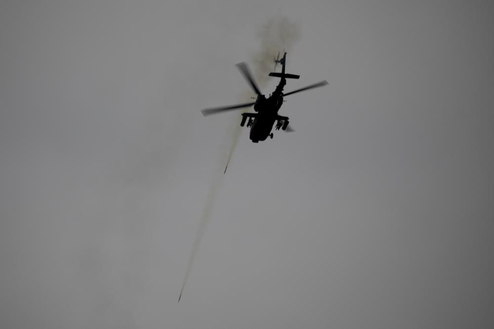 AH-64E Apache Helicopter pilots assigned to 5-17 Air Cavalry Squadron, 2nd Combat Aviation Brigade, 2nd Infantry Division, fires several Hydra 70 missiles during aerial gunnery qualification July 21, 2022, Rodriguez Live Fire Complex, Republic of Korea.