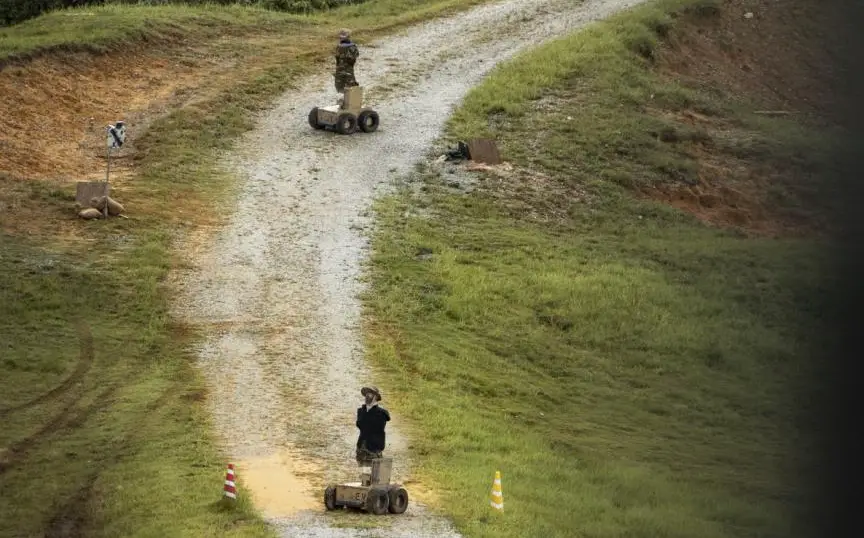 Mobile targets are staged to simulate enemies for aerial sniper training during an Urban Sniper Course on Camp Schwab, Okinawa, Japan, June 15, 2022. 
