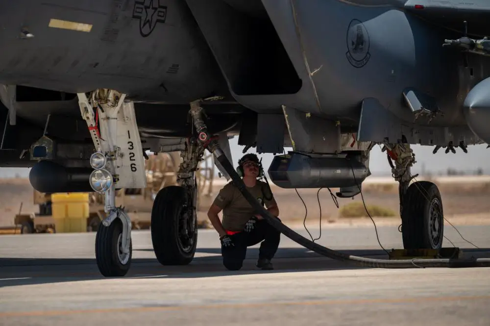 A Ninth Air Force (AFCENT) member initiates hot-pit refueling operations on a F-15E Strike Eagle aircraft assigned to the 48th Fighter Wing out of Royal Air Force Base Lakenheath, United Kingdom July 15, 2022.