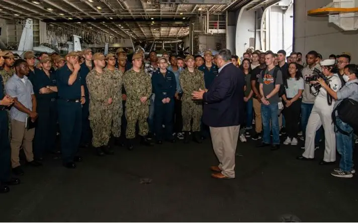 Secretary of the Navy Carlos Del Toro meets with Sailors in the hangar bay of the U.S. Navy’s only forward-deployed aircraft carrier USS Ronald Reagan (CVN 76). 