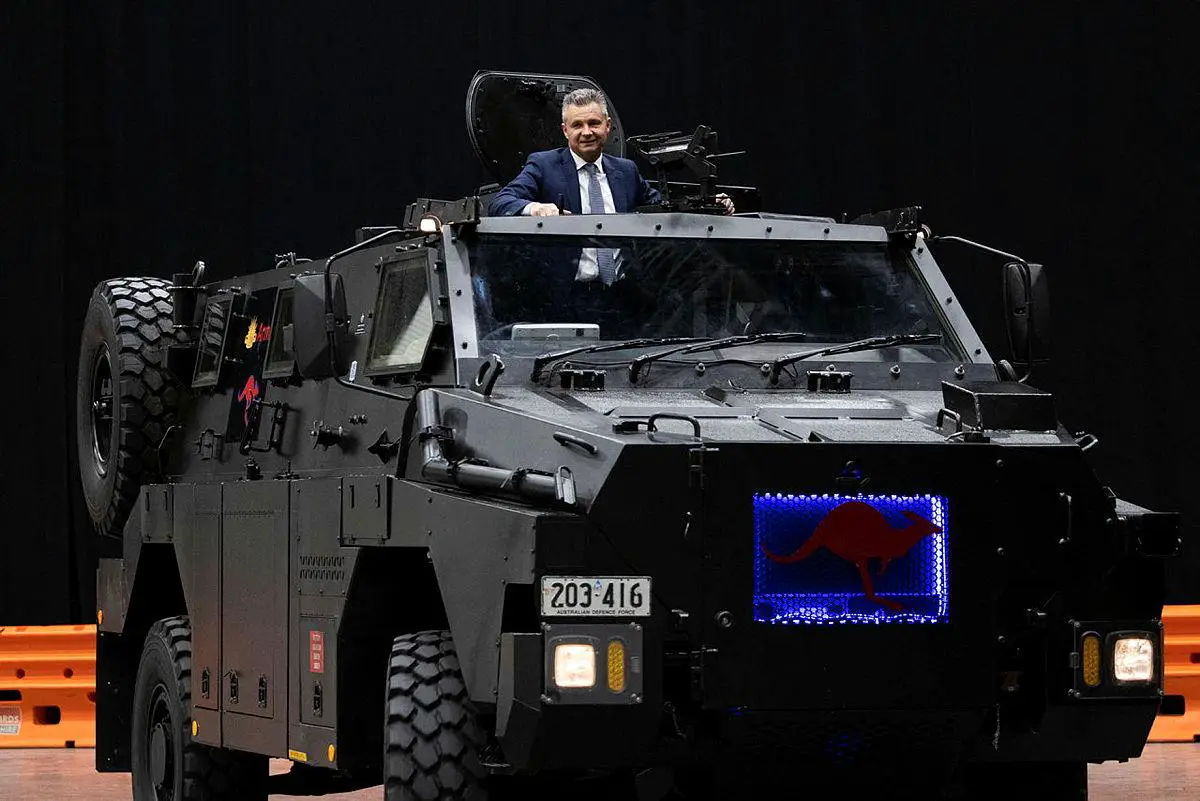 The Hon. Matt Thistlethwaite MP, Assistant Minister for Defence, Assistant Minister for Veterans’ Affairs, and Assistant Minister for the Republic unveils an Bushmaster Electric Protected mobility Vehicle during the Chief of Army Symposium 2022.