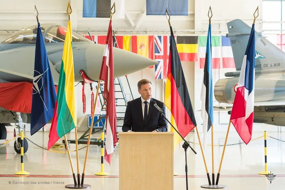 His Excellency the Estonian Minister of Defence, Hanno Pevkur gives his speech in front of a German Eurofighter aircraft and a French Mirage 2000-5 fighter aircraft. 