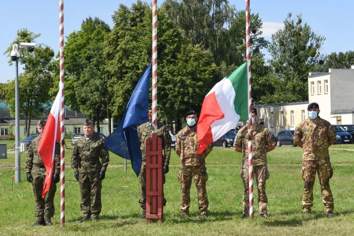 An Italian Eurofighter and a Polish MiG-29 provided the backdrop for the ceremony attended by civilian and military representatives at Malbork Air Base. 