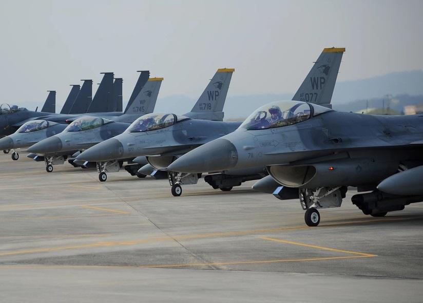  Four U.S. Air Force F-16 Fighting Falcons prepare to take off at Daegu Air Base, Republic of Korea.
