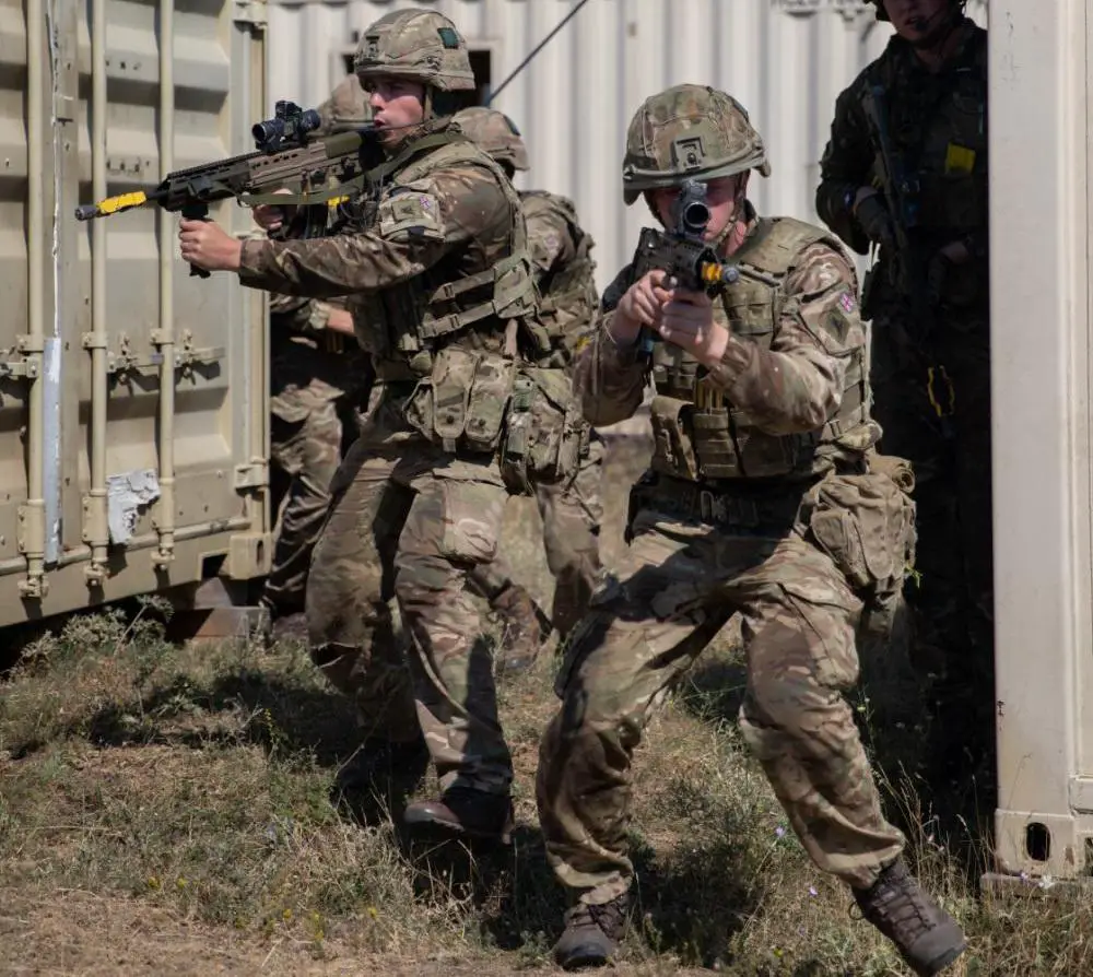 British soldiers, assigned to Charlie Company, 1st Battalion, 1st Royal Irish Regiment, 16th Air Assault Brigade Combat Team, refine tactics, techniques and procedures during a close-quarters battle training event during Exercise Platinum Lion 2022 at Novo Selo Training Area, July 30, 2022.