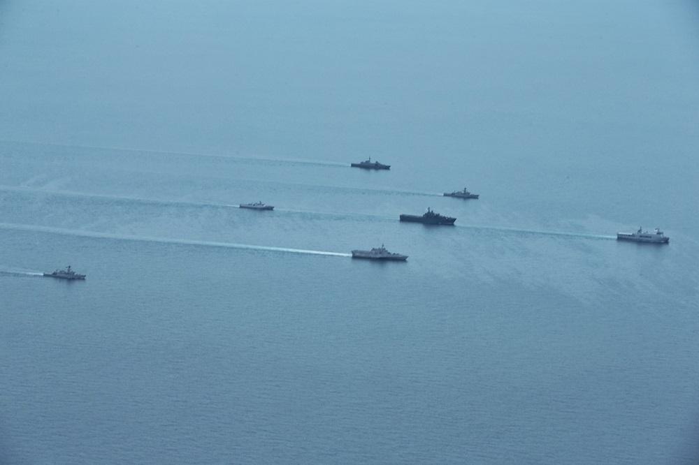 Republic of Singapore Navy RSS Supreme (ship at top row) and RSS Resolution (second ship in middle row) sailing together with ships from Indonesian Navy and U.S. Navy
