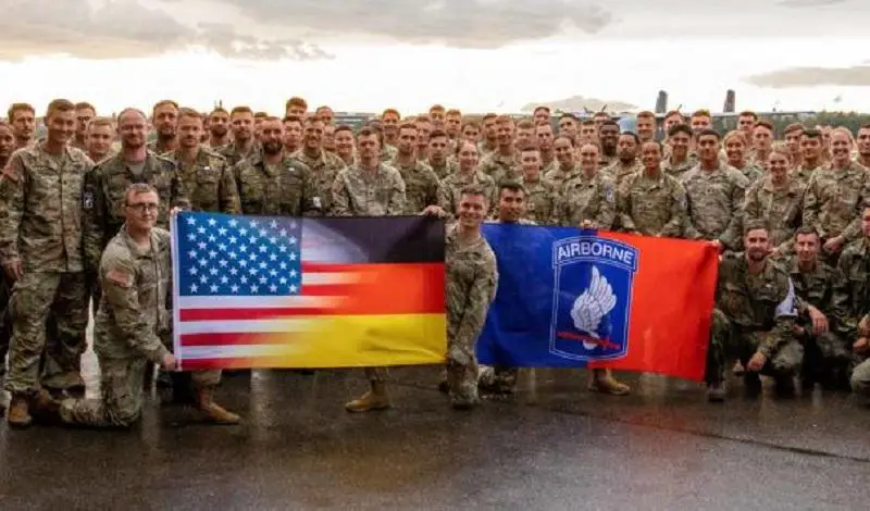 Paratroopers with the U.S. Army’s 173rd Brigade Support Battalion, 173rd Airborne Brigade, and Germany’s 26th Airborne Brigade ‘Saarland’ pose for a group photo after an airborne-operation at Lake Constance, Germany, July 29, 2022. Approximately 75 paratroopers from each country participated in the operation.