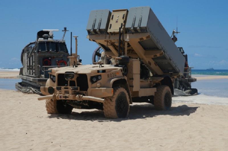 A NMESIS (Navy Marine Expeditionary Ship Interdiction System) launcher on ROGUE Fires (Remotely Operated Ground Unit for Expeditionary Fires) Oshkosh JLTV deploys into position aboard Pacific Missile Range Facility Barking Sands, Hawaii, Aug. 16, 2021.