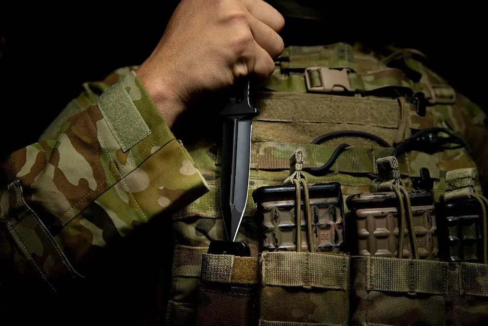 Australian manufacturer ZU Bladeworx’s Double-Edged Fighting Knife has been selected as the basis of the ADF’s new Hand-to-Hand Fighting System. The black, double-edged fighting knife has a 100mm blade, is machined from a solid billet of A2 steel and features a non-slip handle and retention ring.