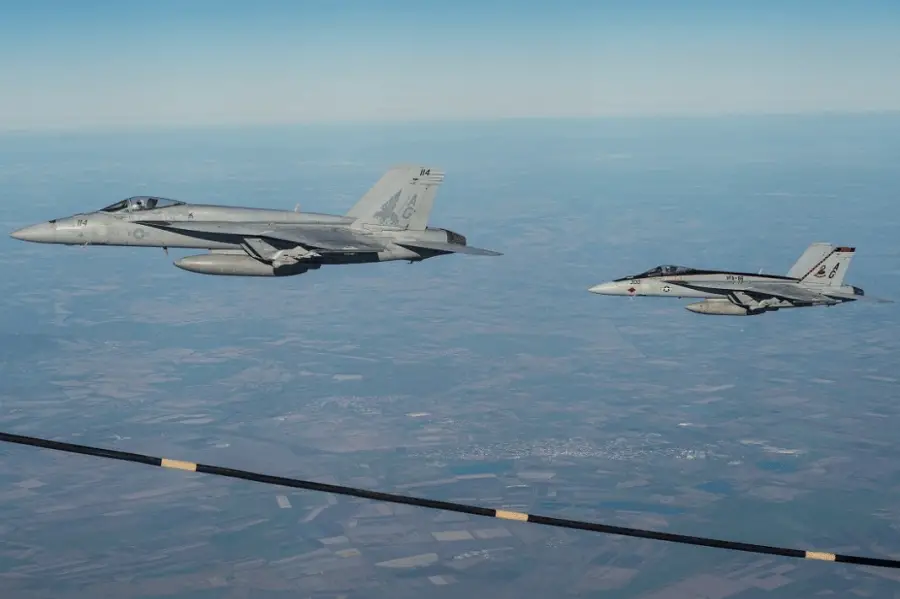 Two of the four U.S. Navy F/A-18 fighters flying alongside a French A-330 MRTT Phénix during the mission above Hungary