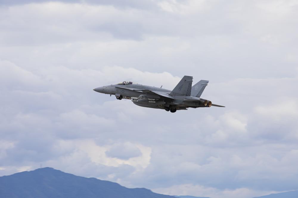 A U.S. Marine Corps F/A-18C Hornet aircraft with Marine All Weather Fighter Attack Squadron (VMFA(AW)) 533 takes off from Marine Corps Air Station Iwakuni, Japan, Sept. 28, 2022.
