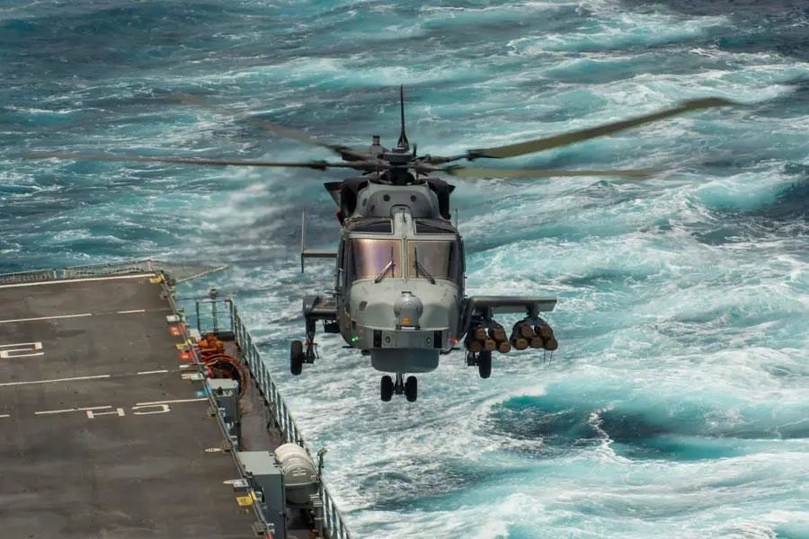 Royal Navy Wildcat naval helicopter carrying ten Martlet air-to-surface/anti-ship missiles on port side weapon wing.