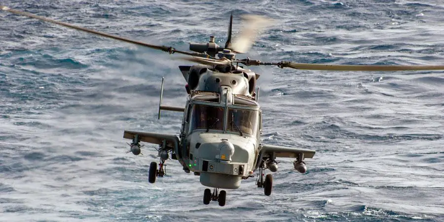 Royal Navy Wildcat naval helicopter carrying four Sea Venom air-to-surface/anti-ship missiles.