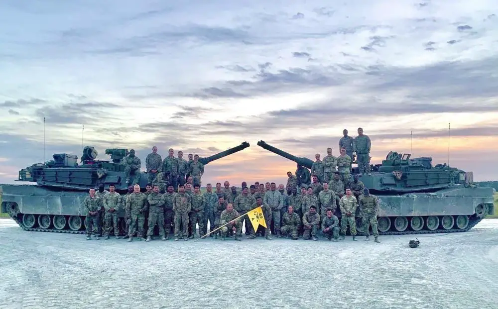 Alpha Company, 2nd Battalion, 69th Armor Regiment, 2nd Armored Brigade Combat Team, poses for a company photo after completing day and night Table VI operator new equipment training that concludes modernization for the 