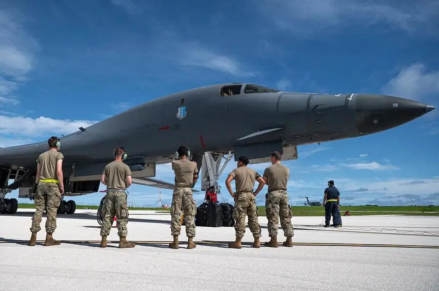 Airmen assigned to the 28th Bomb Wing recieve a U.S. Air Force B-1B Lancer assigned to the 37th Expeditionary Bomb Squadron, Ellsworth Air Force Base, South Dakota, after landing at Andersen Air Force Base, Guam, in support of a Bomber Task Force mission, October 18, 2022.