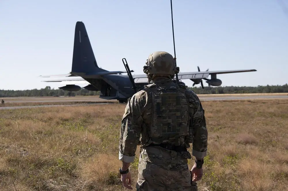 An air commando from the 26th Special Tactics Squadron at Cannon Air Force Base, N.M., provides oversight of an MC-130J on the Eglin Air Force Base, Fla. range during Emerald Flag Oct. 19, 2022. The aircraft was refueling an MQ-9 Reaper aircraft demonstrating the Air Force's Agile Combat Employment capability against potential adversaries. (U.S. Air Force photo by Lt. Col. James R. Wilson)