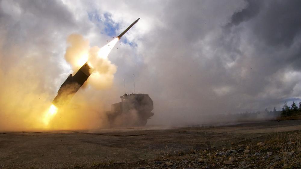 A U.S. Army M142 High Mobility Artillery Rocket System fires a rocket as part of Nordic Strike 22, at Vidsel Test Range, Sweden.