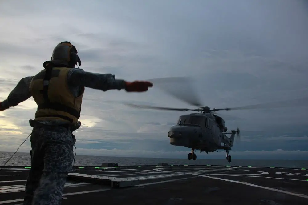 RMN's Super Lynx helicopter conducted a deck landing on RSS Supreme during the sea phase.