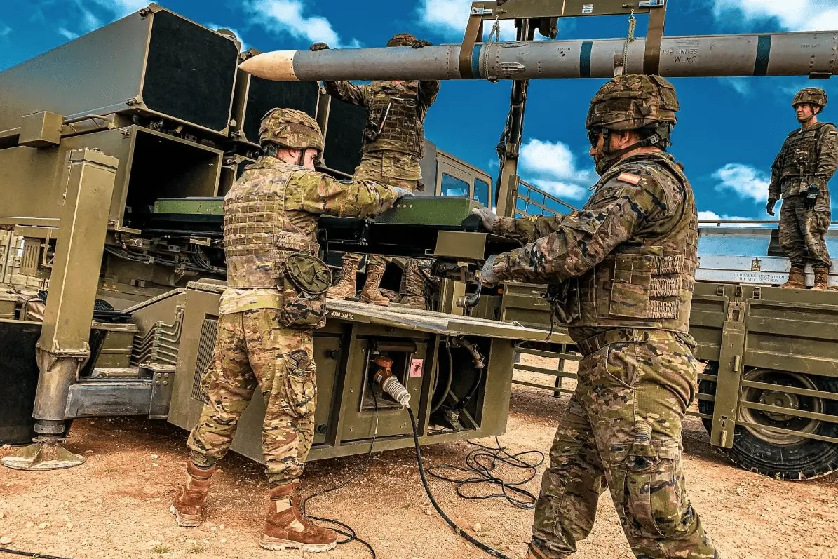 Spanish personnel maintaining and preparing a NASAMS launcher at Lievlarde Air Base, Latvia.