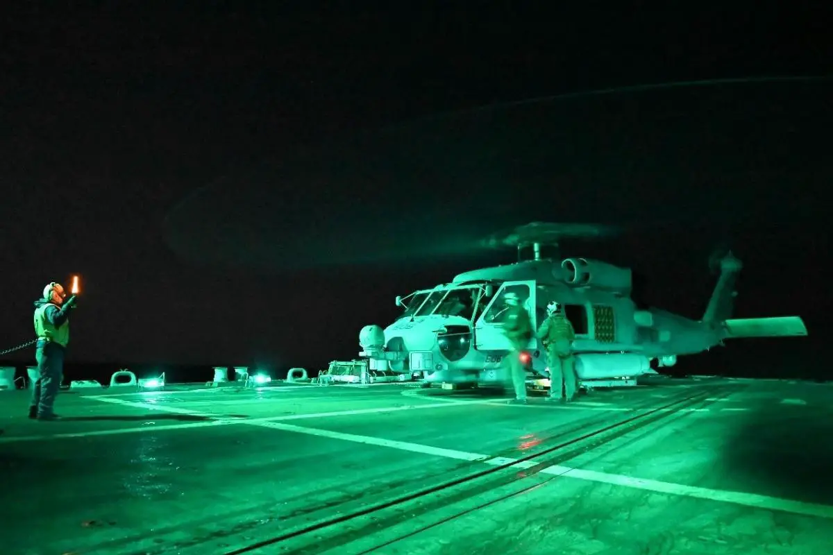  An MH60R “Jaguar 606” of Helicopter Maritime Strike Squadron 60 (HSM 60) conducts flight operations on the flight deck off of the Forrest Sherman. 