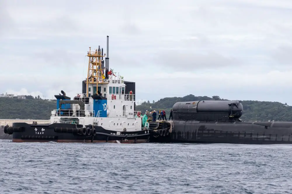 The Ohio-class guided-missile submarine USS Michigan (SSGN 727) made a brief stop for personnel (BSP) near Okinawa, Japan as part of its deployment to the U.S. 7th Fleet area of operations, Nov. 10. Michigan is homeported at Naval Base Kitsap, Washington and is operating in the U.S. 7th Fleet area of operations, conducting maritime security operations and supporting national security interests. (U.S. Marine Corps photo by Staff Sgt. Andrew Ochoa)